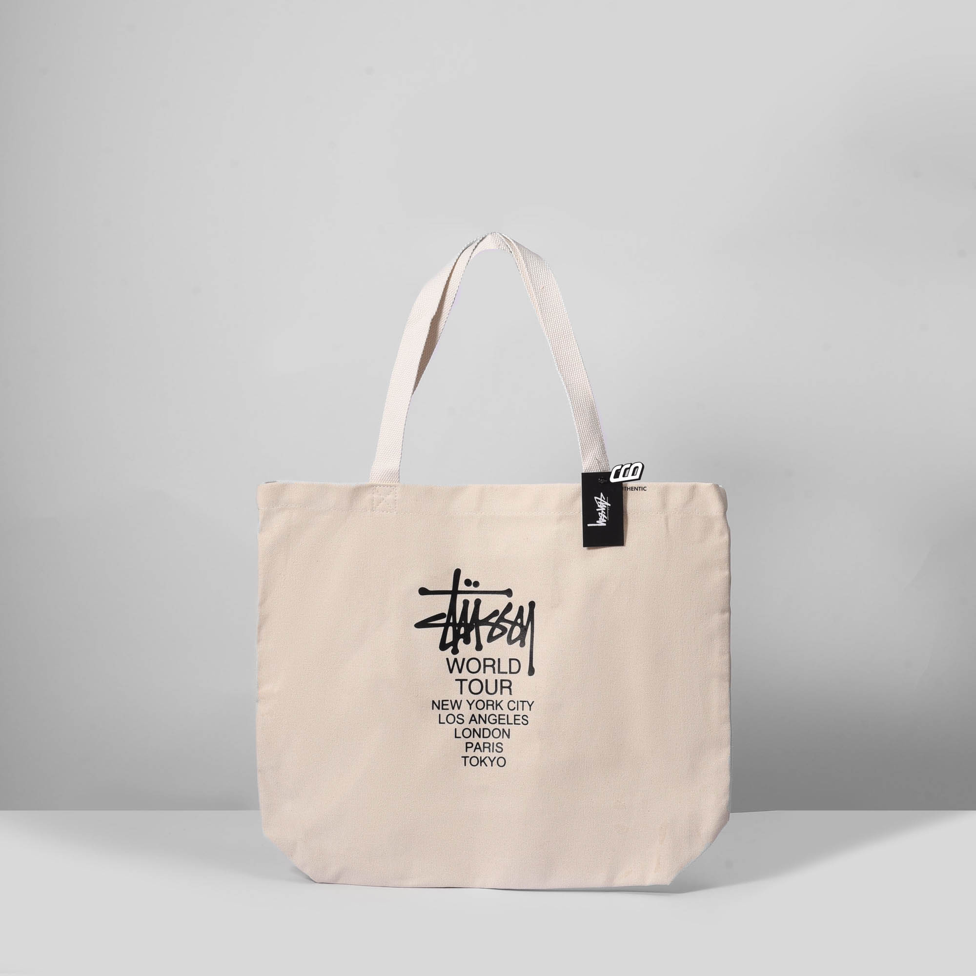 STUSSY WORLD TOUR TOTE BAG - NATURAL