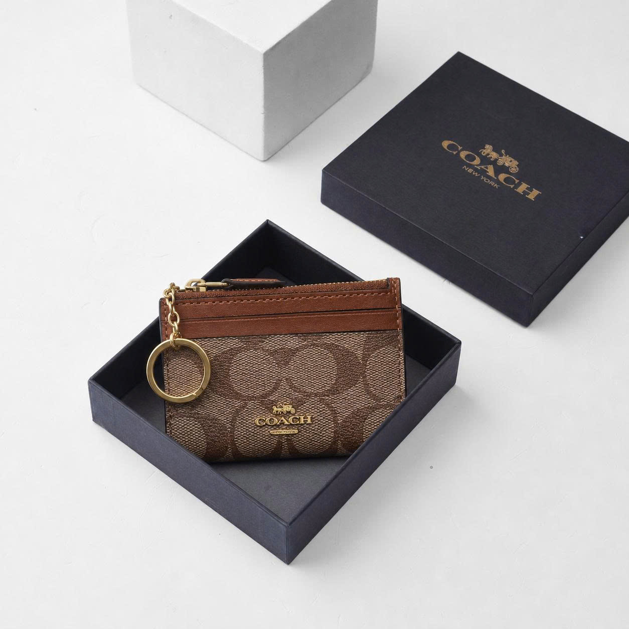 COACH SIGNATURE CANVAS SKINNY ZIP ID CARD - BEIGE/BROWN