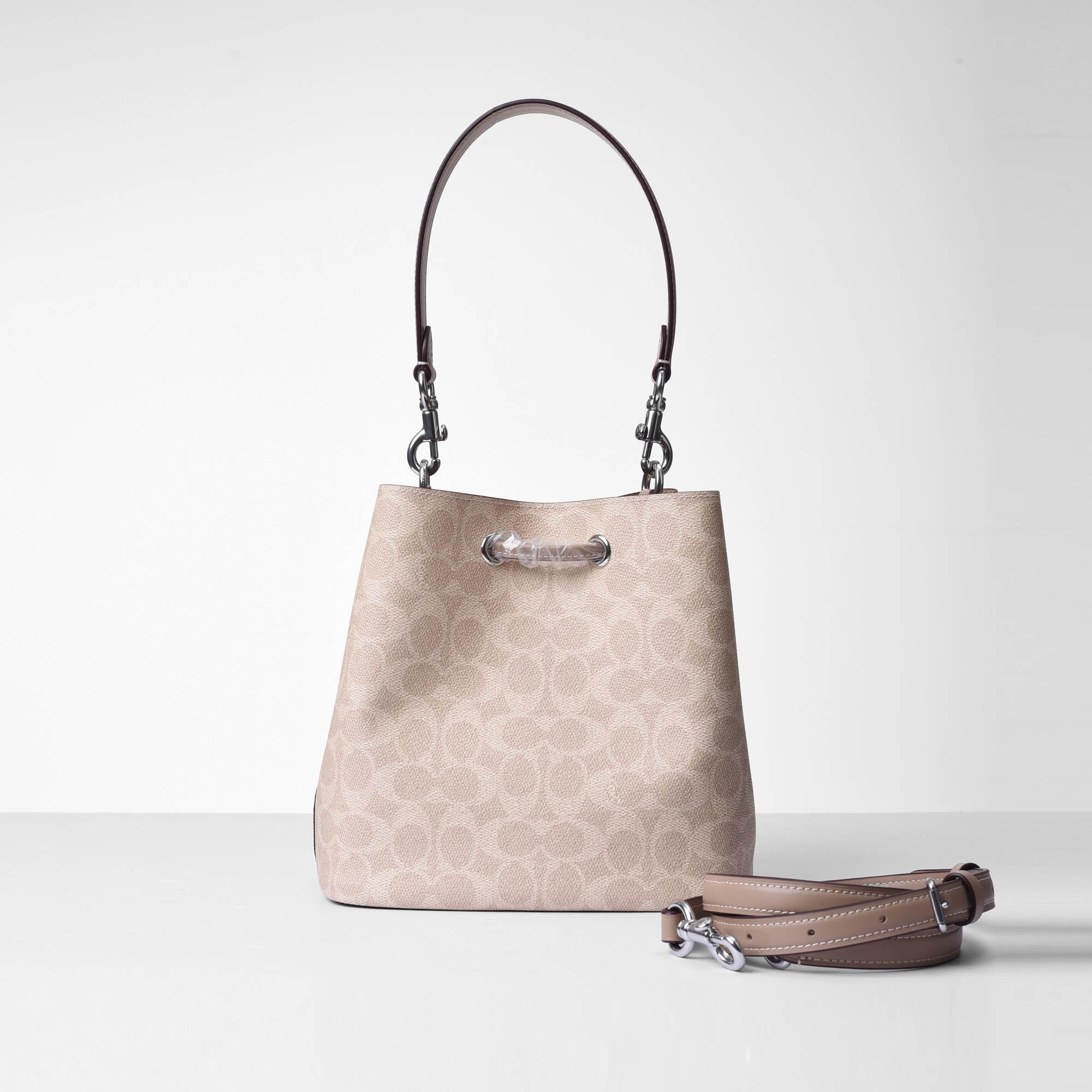 COACH SIGNATURE ROWAN BUCKET BAG - SAND
