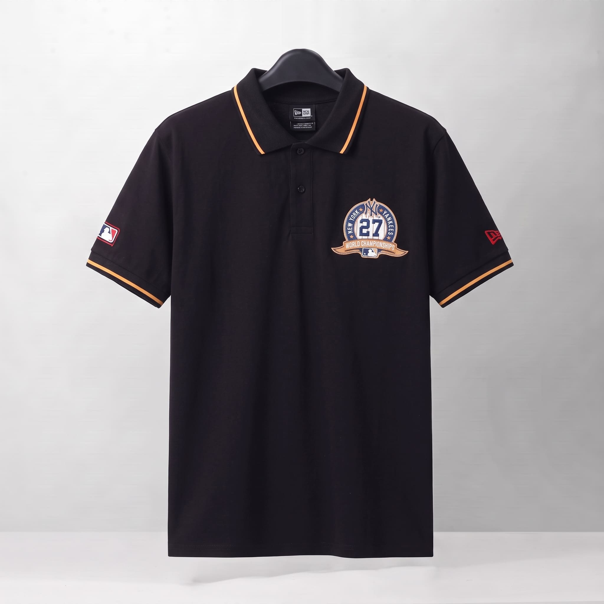 NEW ERA 27 CHAMPIONSHIPS POLO SHIRT - BLACK