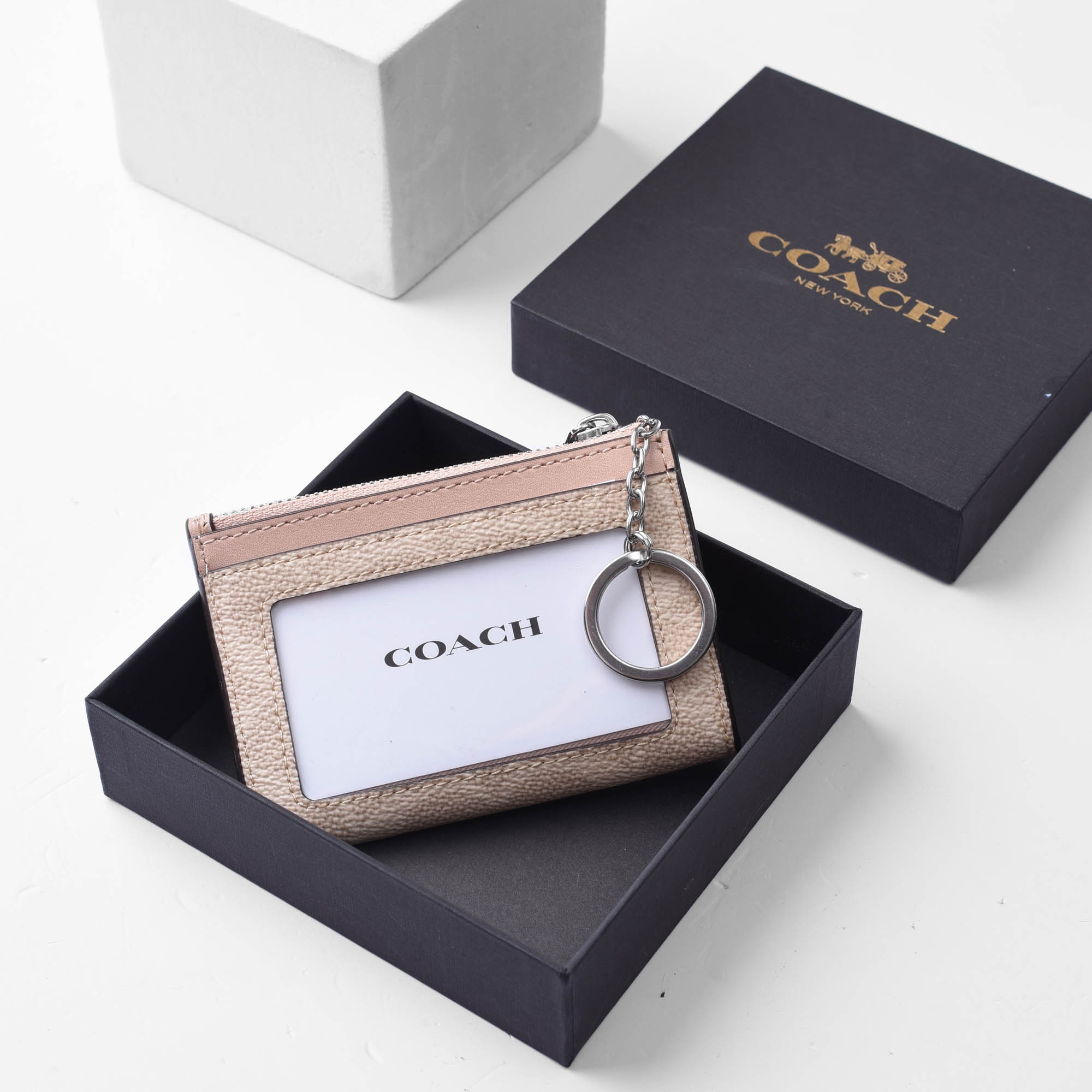 COACH SIGNATURE CANVAS SKINNY ZIP ID CARD - SAND