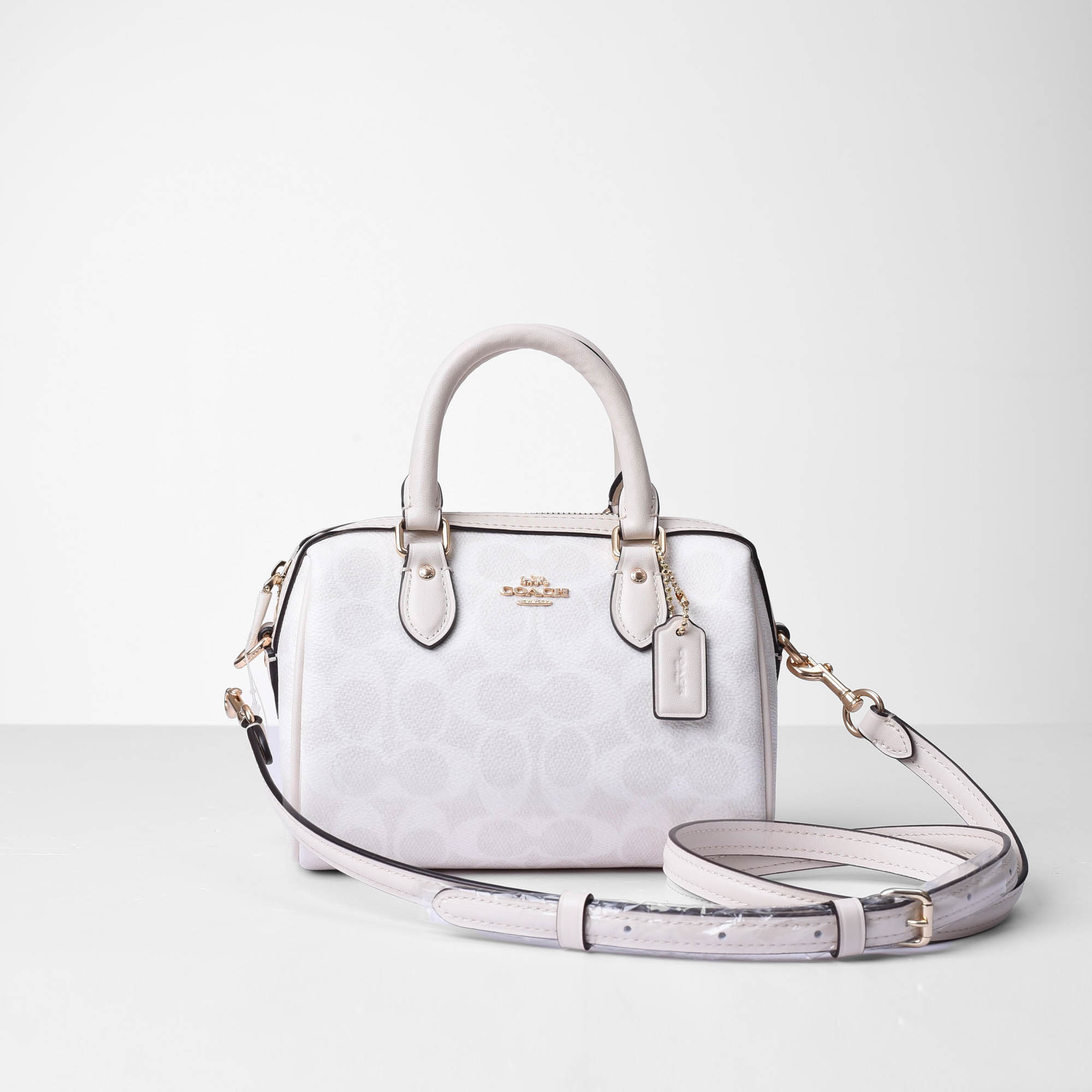 COACH SIGNATURE MINI ROWAN CROSS BAG - WHITE