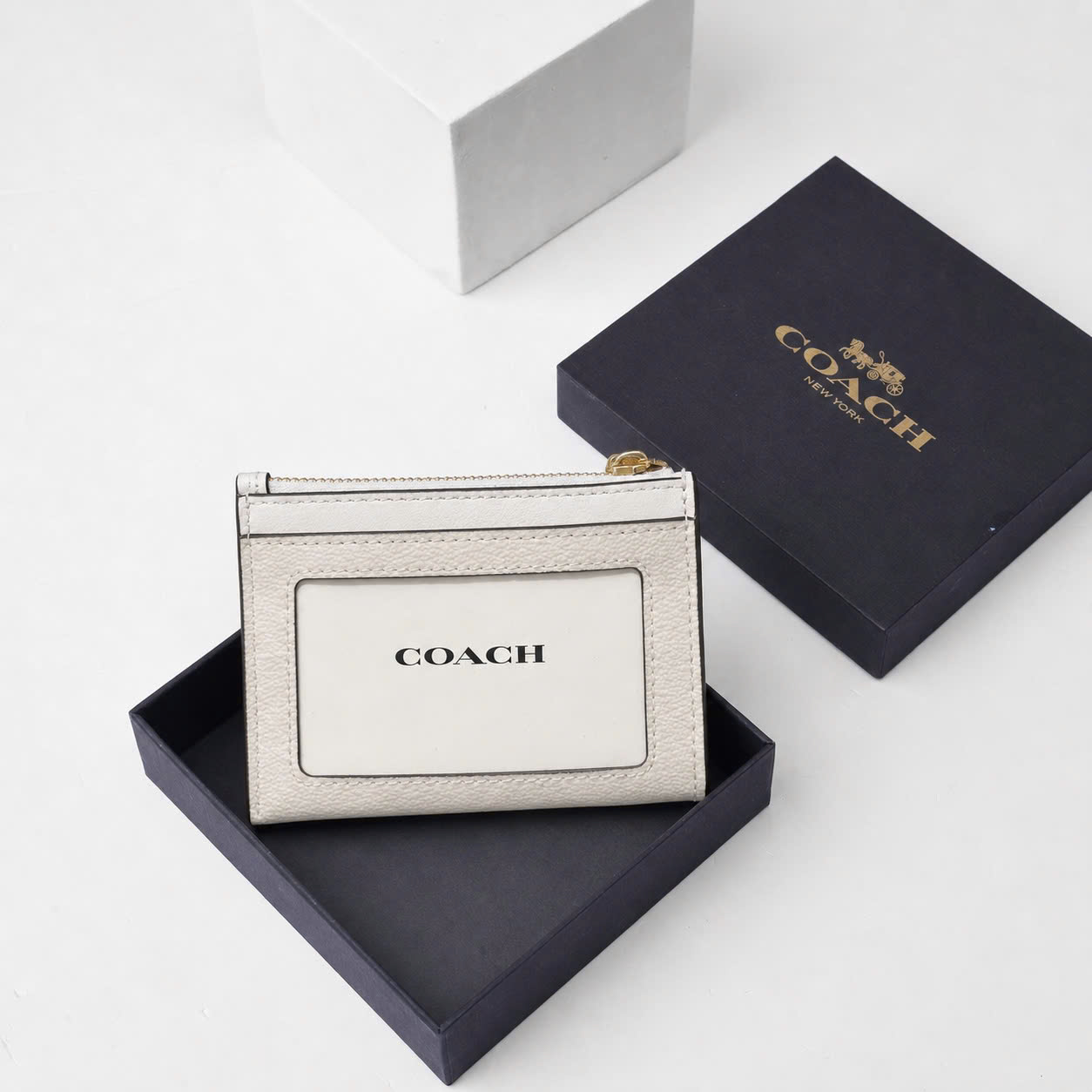 COACH SIGNATURE CANVAS SKINNY ZIP ID CARD - WHITE