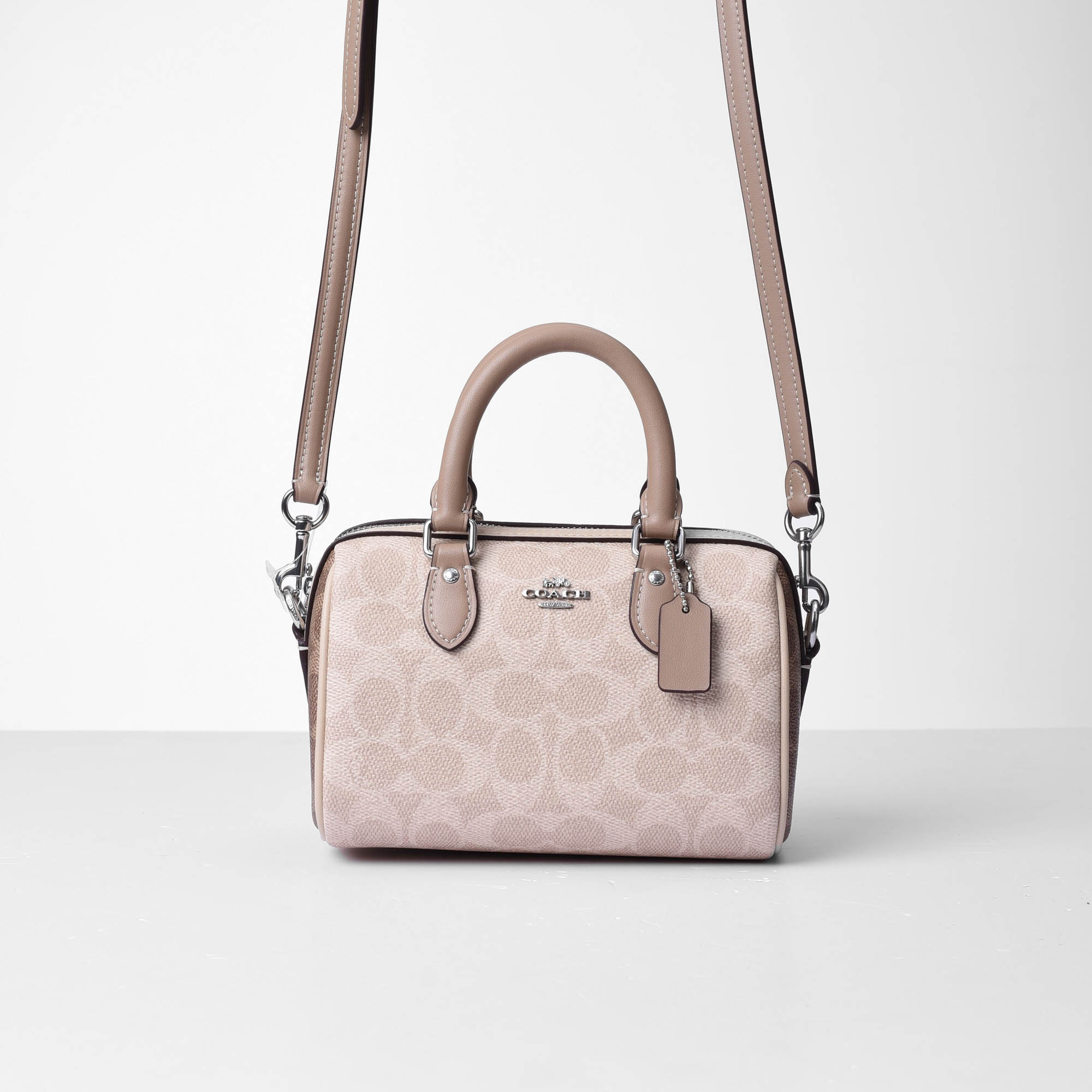 COACH SIGNATURE MINI ROWAN CROSS BAG - SAND