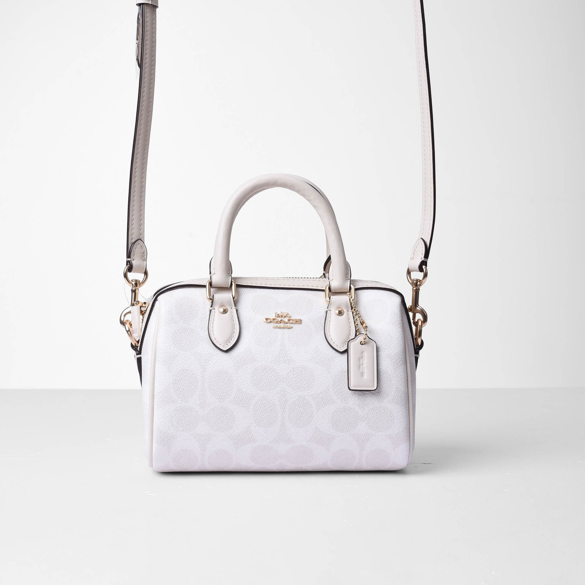 COACH SIGNATURE MINI ROWAN CROSS BAG - WHITE